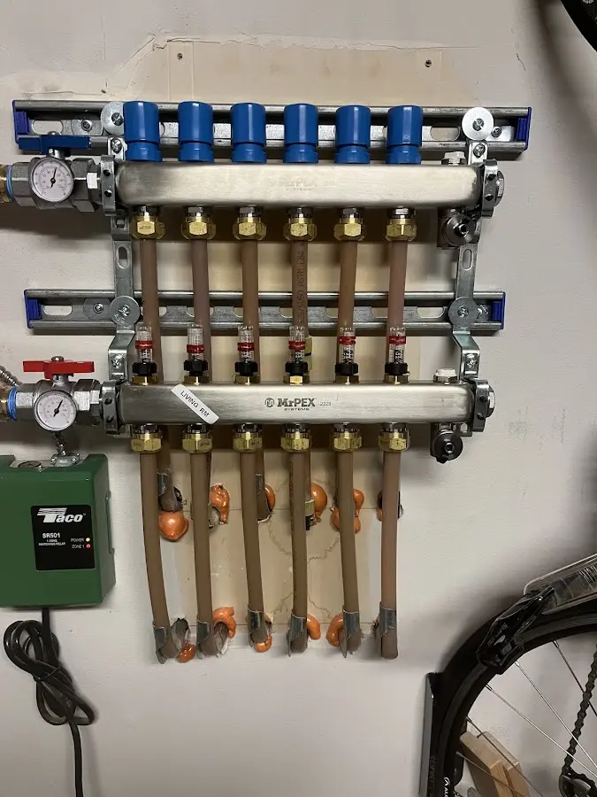 Plumber performing Water Heater Repair at a residential property in Yorkville